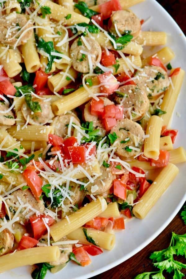 An overhead photo of the Sausage Pasta Skillet that is topped with parmesan cheese
