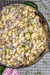 overhead of a skillet of Philly cheesesteak Mac and cheese