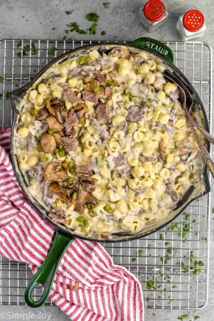 overhead of a skillet of Philly cheesesteak Mac and cheese