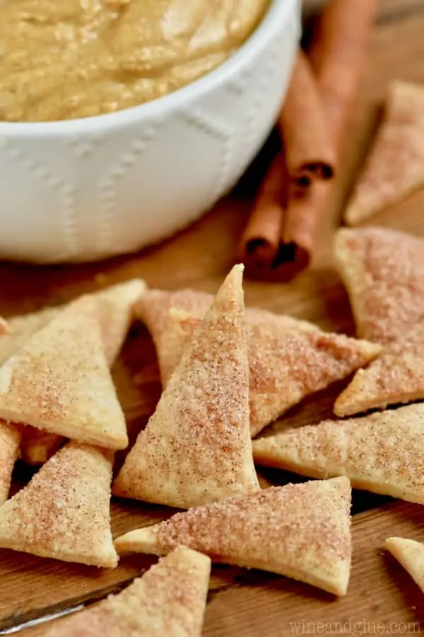 Close up photo of the Cinnamon Sugar Pie Crust Dippers that are in little triangles and coated with cinnamon and sugar. 