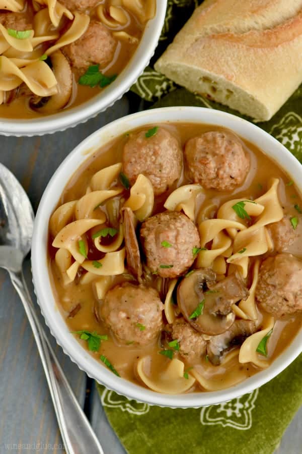 The Meatball Beef Stroganoff are in a white bowl with a slice of bread