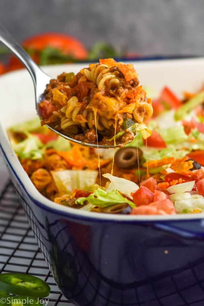 picture of spoon dishing up taco casserole recipe