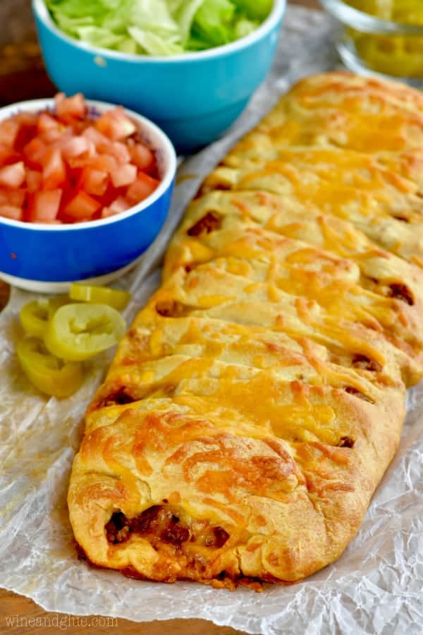 crescent dough that has been braided, filled with taco meat, and baked