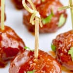 honey bbq cocktail meatball with a toothpick sticking out
