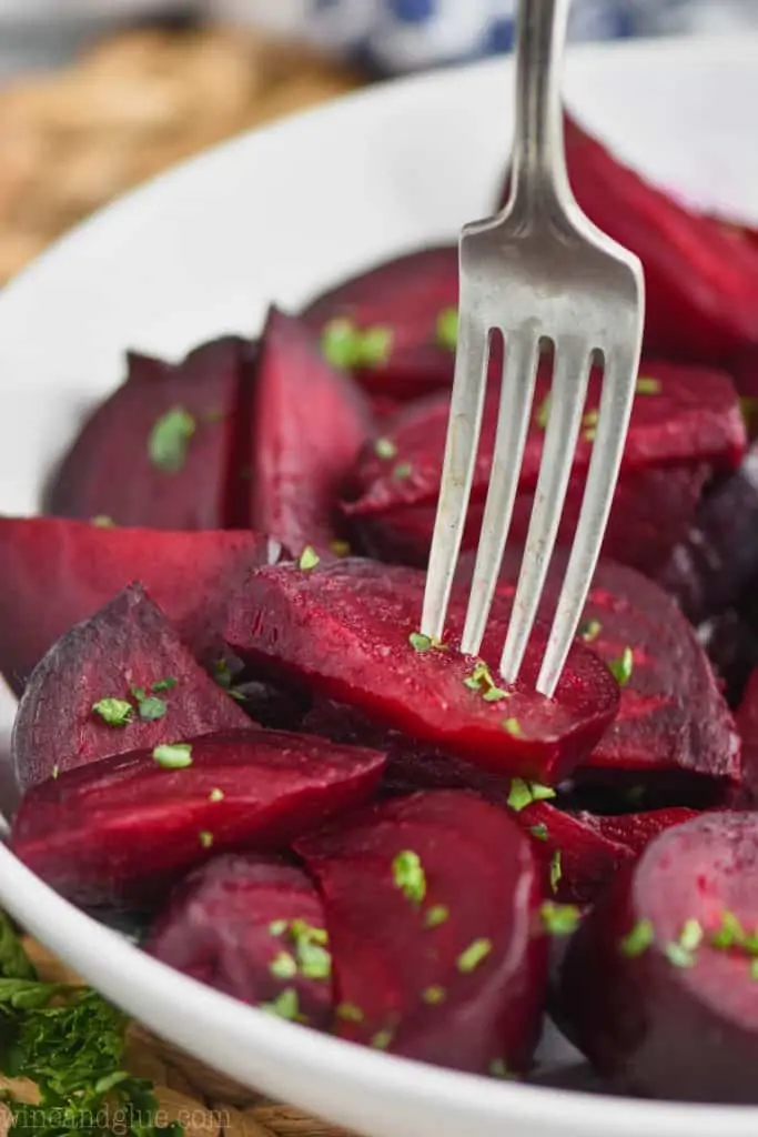 fork piercing a baked beet 