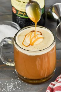 a drizzle of caramel going over a creamy irish coffee recipe