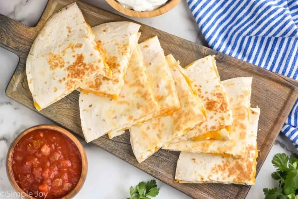 overhead of a platter of chicken quesadillas