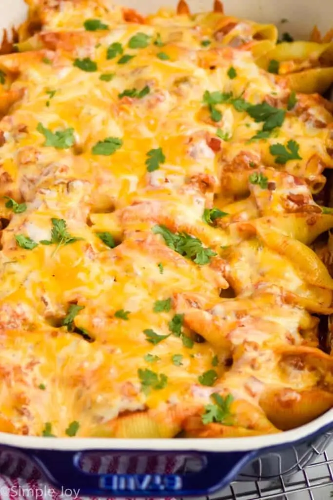 side view of a casserole dish full of stuffed shells