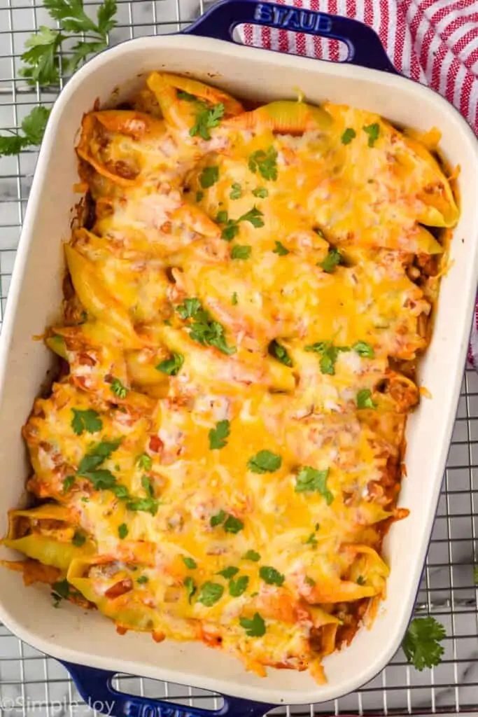 overhead of a pan of taco stuffed shells recipe