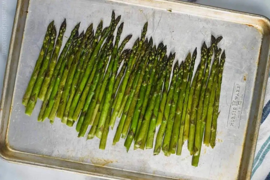 oven roasted asparagus on a baking sheet