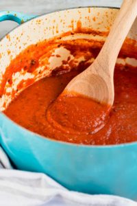 marinara sauce recipe with tomato sauce in a dutch oven