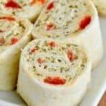 These Pesto Cream Cheese Pinwheels are the perfect appetizer to make. This appetizer recipe comes together quickly, and everything in them goes together so perfectly. - 8