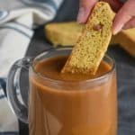 biscotti being dipped into coffee