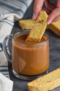 biscotti being dipped into coffee