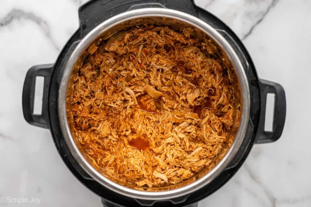 overhead of a shredded taco chicken in an instant pot