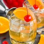 how to make the best amaretto sour in a glass with cherry and orange - 11