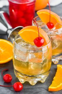 how to make the best amaretto sour in a glass with cherry and orange