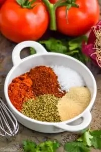 fajita seasoning recipe broken down by ingredient in a small white dish