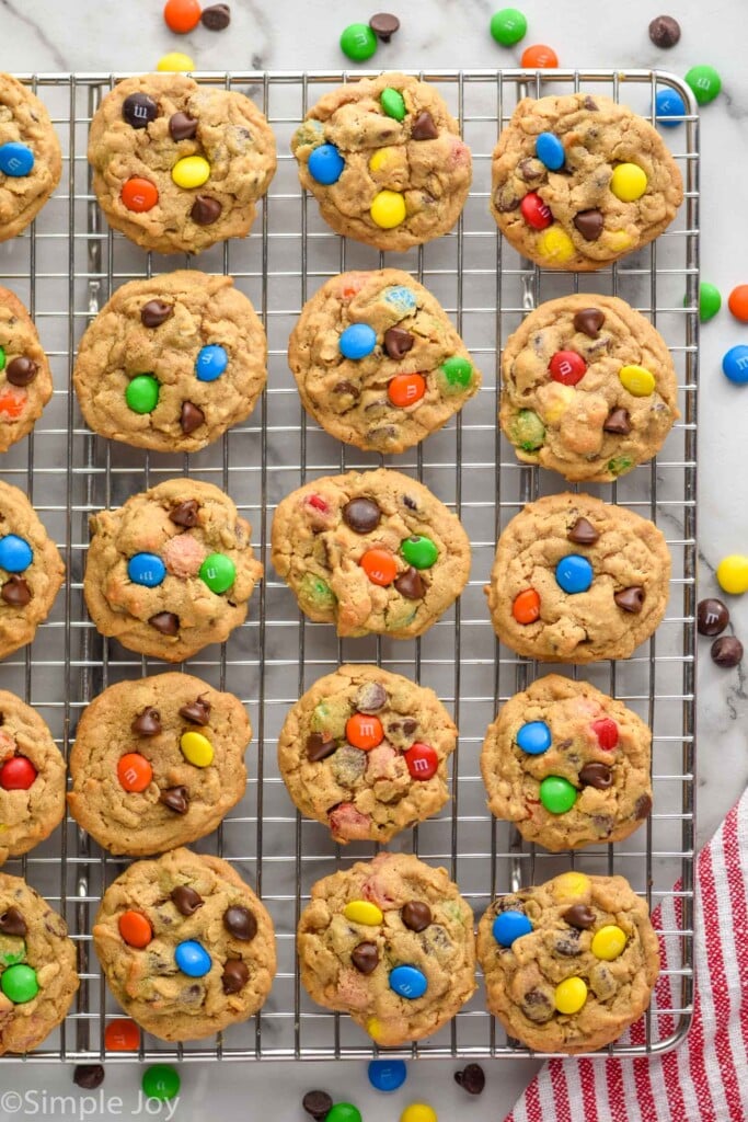 Overhead photo of Monster Cookies on a cooking rack.