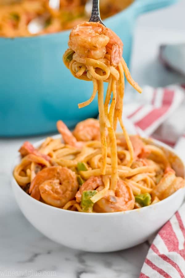 bowl of one pot shrimp fajita pasta with forkful coming out
