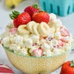 strawberry banana fluff recipe in a bowl with fresh strawberries and bananas - 13