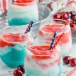 layered wine slushies with red white and blue for fourth of july cocktail
