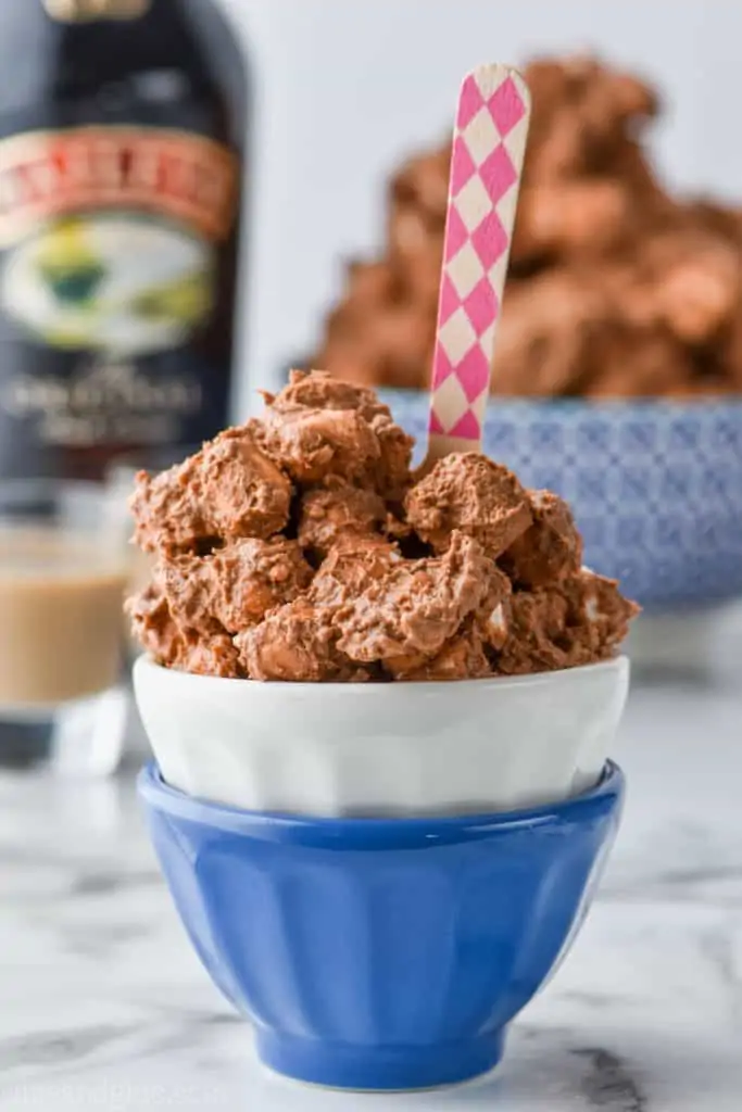 two small bowls stacked with some baileys dessert salad in them