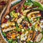 overhead photo of cherry and easy corn salad recipe with grilled chicken and cheese - 13