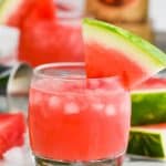 front view of watermelon vodka tonic in a tumbler and garn - 13
