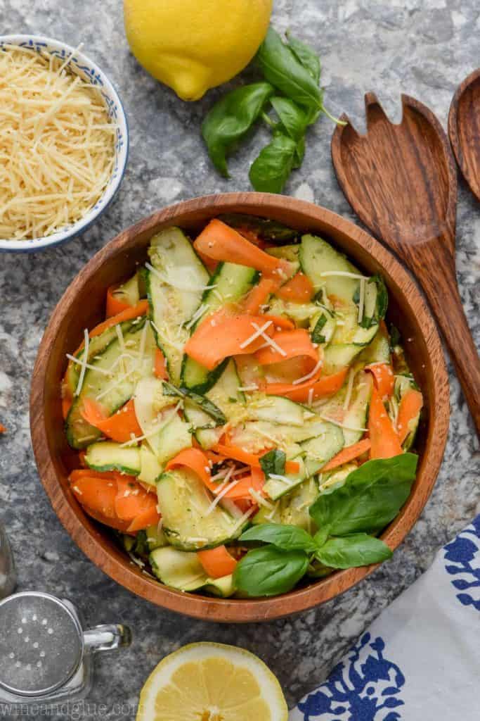 overhead view of marinated zucchini salad in wood bowl