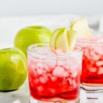 cranberry apple whiskey cocktail garnished with apple - 14