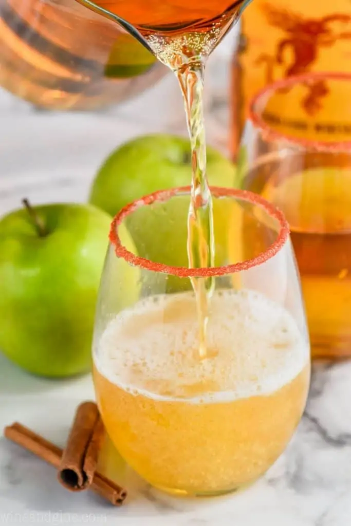 fireball punch being poured into a glass