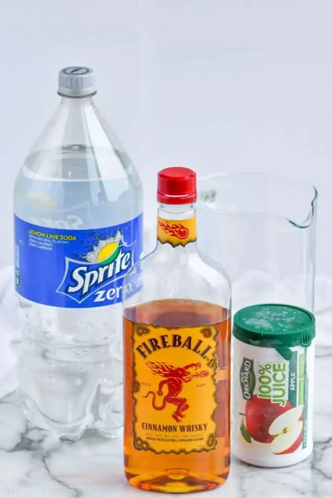 ingredients (Sprite zero, Fireball, Apple Juice) for fireball whiskey punch 