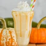 boozy pumpkin milkshake with whipped cream and straws - 17