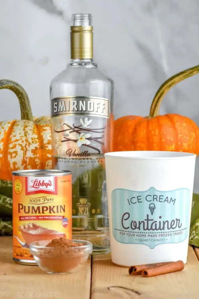 ingredients for a boozy pumpkin milkshake (pureed pumpkin, cinnamon, Vanilla Smirnoff, and ice cream)