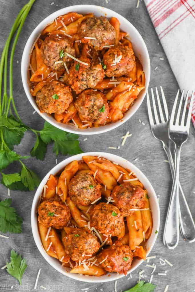 overhead view of two bowls of pasta and meatballs made in the instant pot