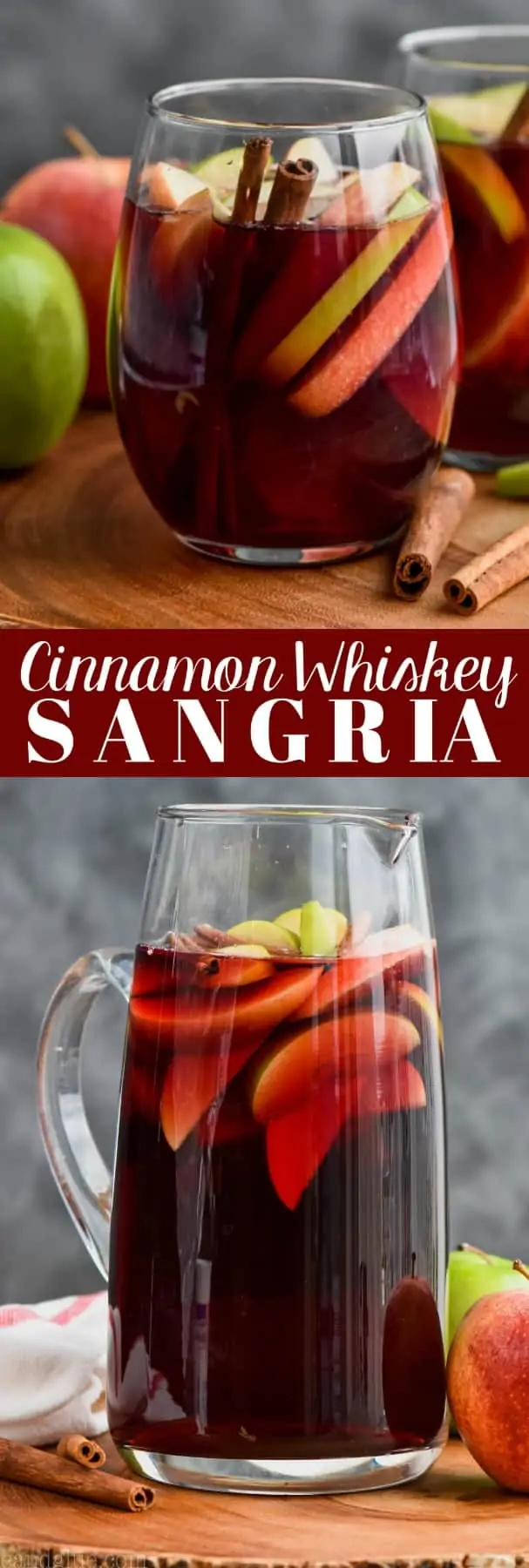 glass of cinnamon whiskey sangria filled with apple slices and cinnamon sticks