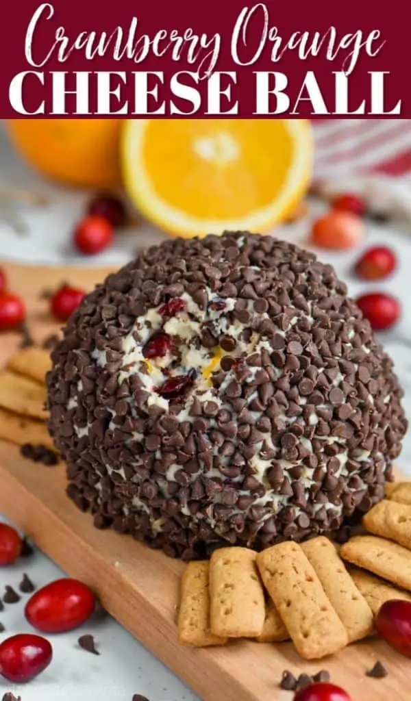 chocolate chip coated cranberry orange cheese ball recipe on a cutting board with crackers