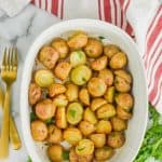 overhead view of baking dish full of roasted baby potatoes recipe