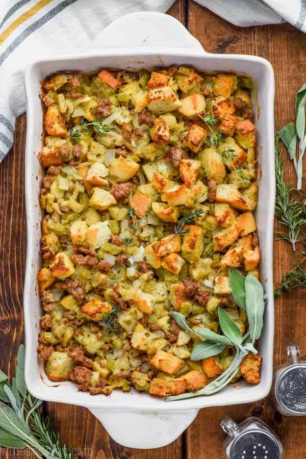 overhead view of the best homemade stuffing recipe garnished with fresh sage