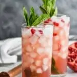 two pomegranate mojitos