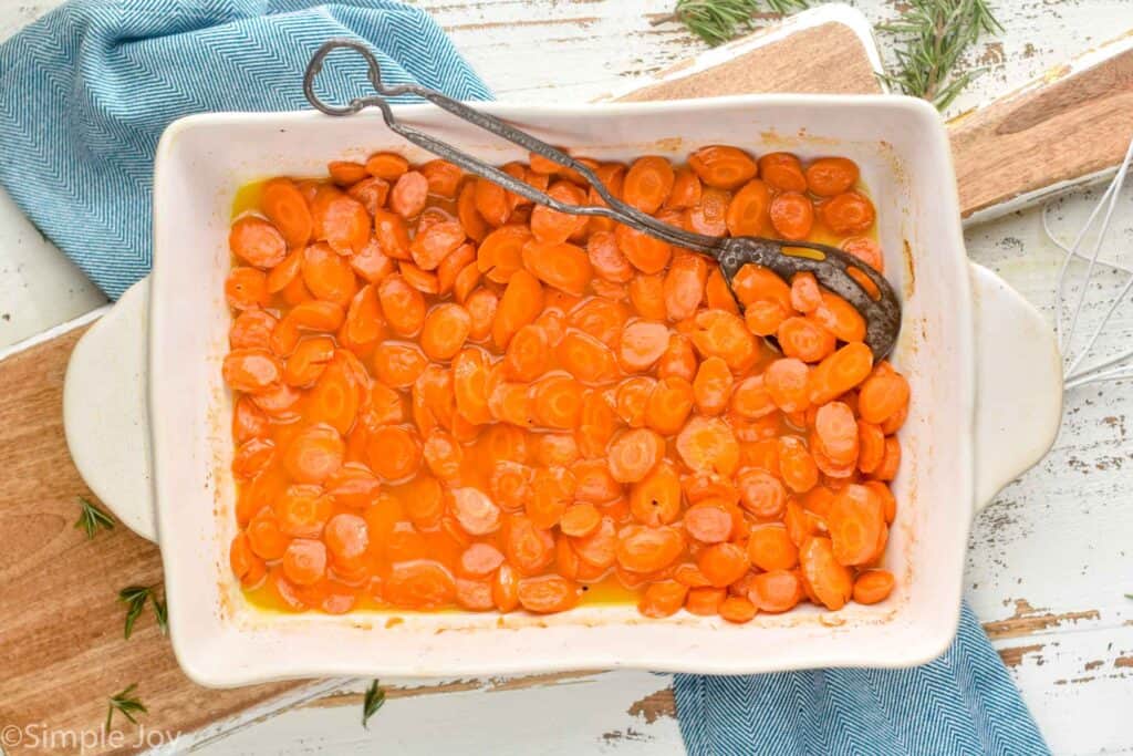 overhead view of a baking dish full of roasted carrots recipe