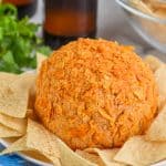 homemade cheese ball recipe on a plate with tortilla chips