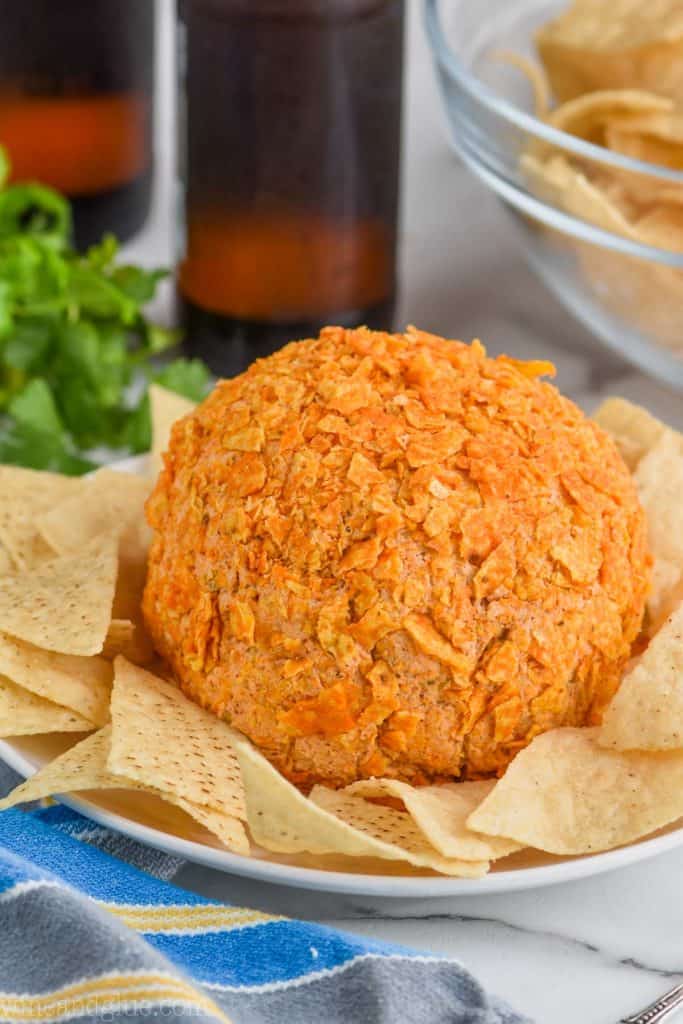 homemade cheese ball recipe on a plate with tortilla chips