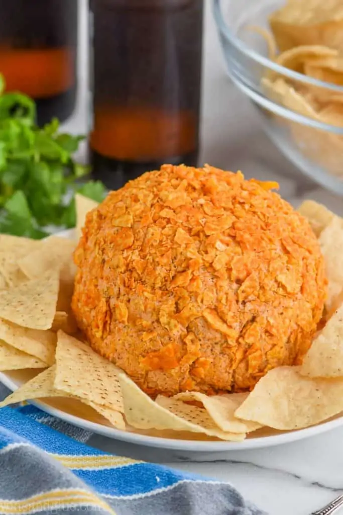 homemade cheese ball recipe on a plate with tortilla chips