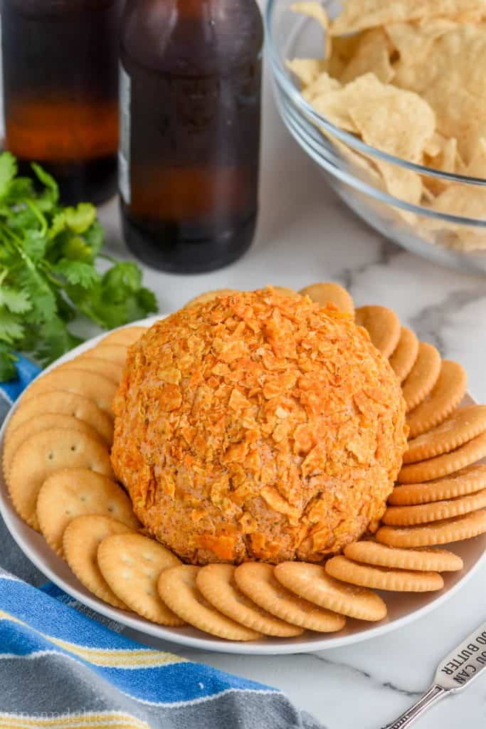 classic cheese ball recipe on a plate with ritz crackers