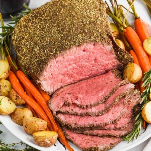 https://www.simplejoy.com/wp-content/uploads/2018/11/top_round_roast_beef_recipe_image-500x500.jpg