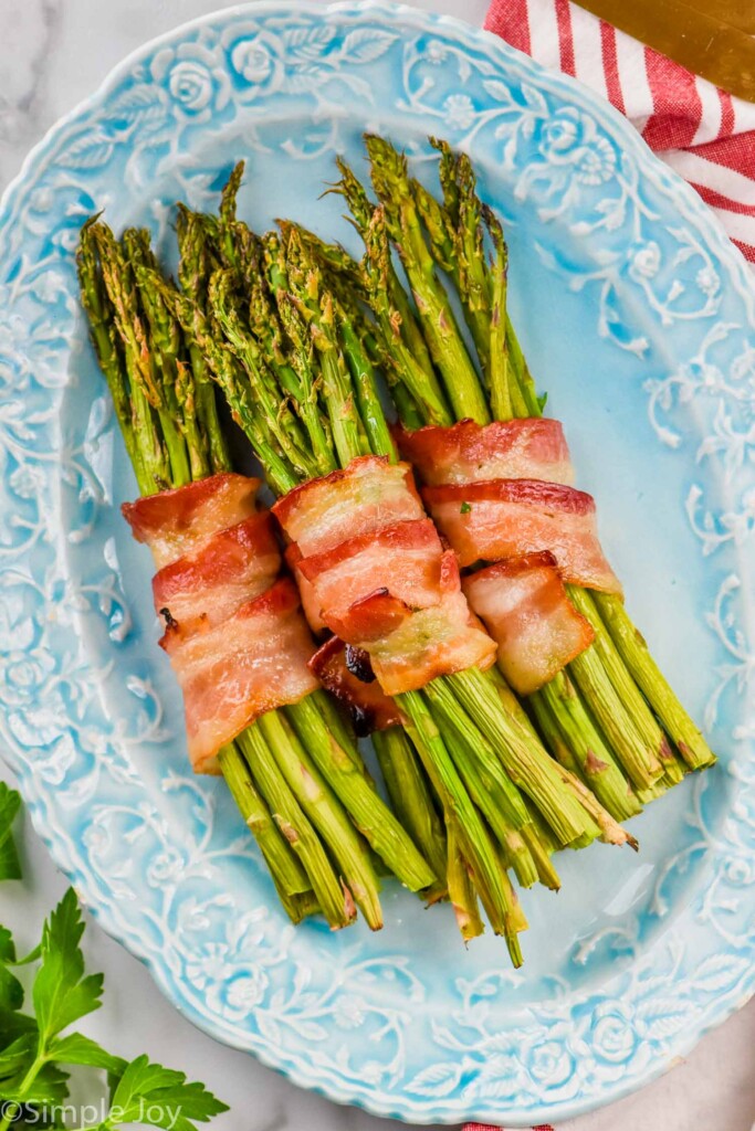 bacon wrapped asparagus on a platter