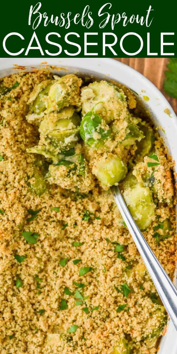 overhead view of baked brussel sprouts casserole in casserole dish being spooned out
