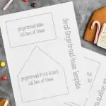 overhead photo of gingerbread house template printable next to gingerbread pieces